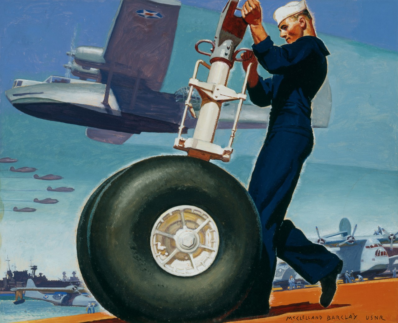 Sailor working on the wheel of an airplane