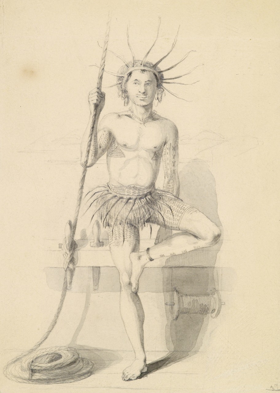A man in a grass skirt is standing on one leg holding a rope