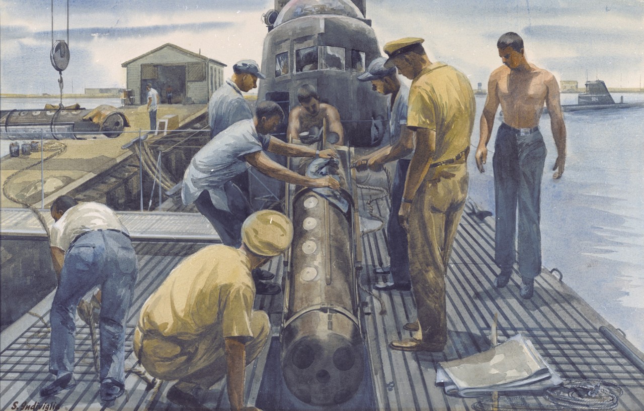 A crew on the deck of a submarine are maneuvering a torpedo