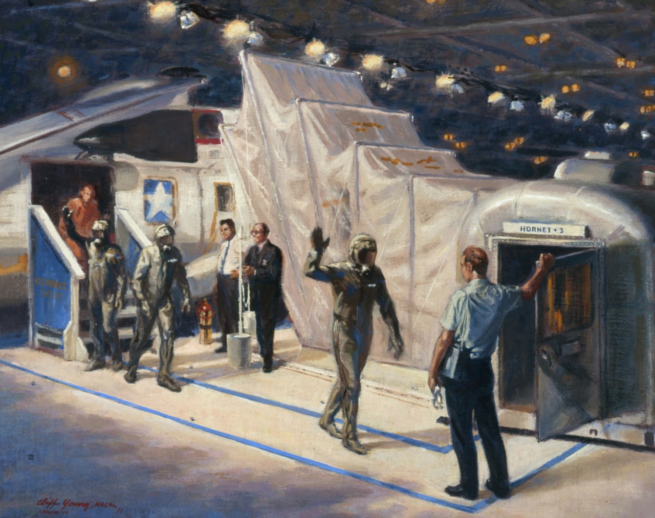 The astronauts heading to a decontamination chamber
