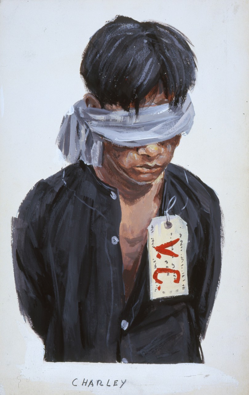 A Viet Cong prisoner blindfolded and tagged