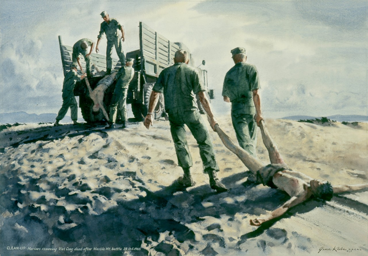 Marines gather the Viet Cong dead