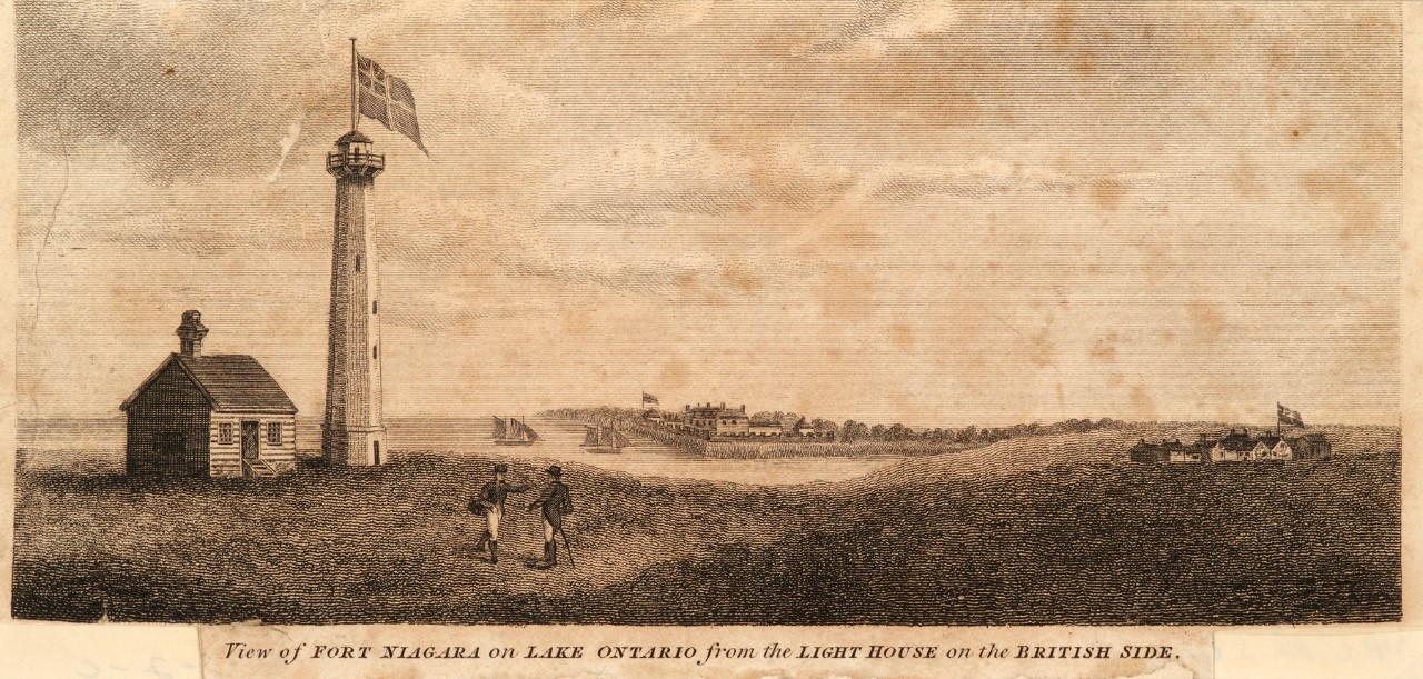 A lighthouse on a hill looks across the river to a fort