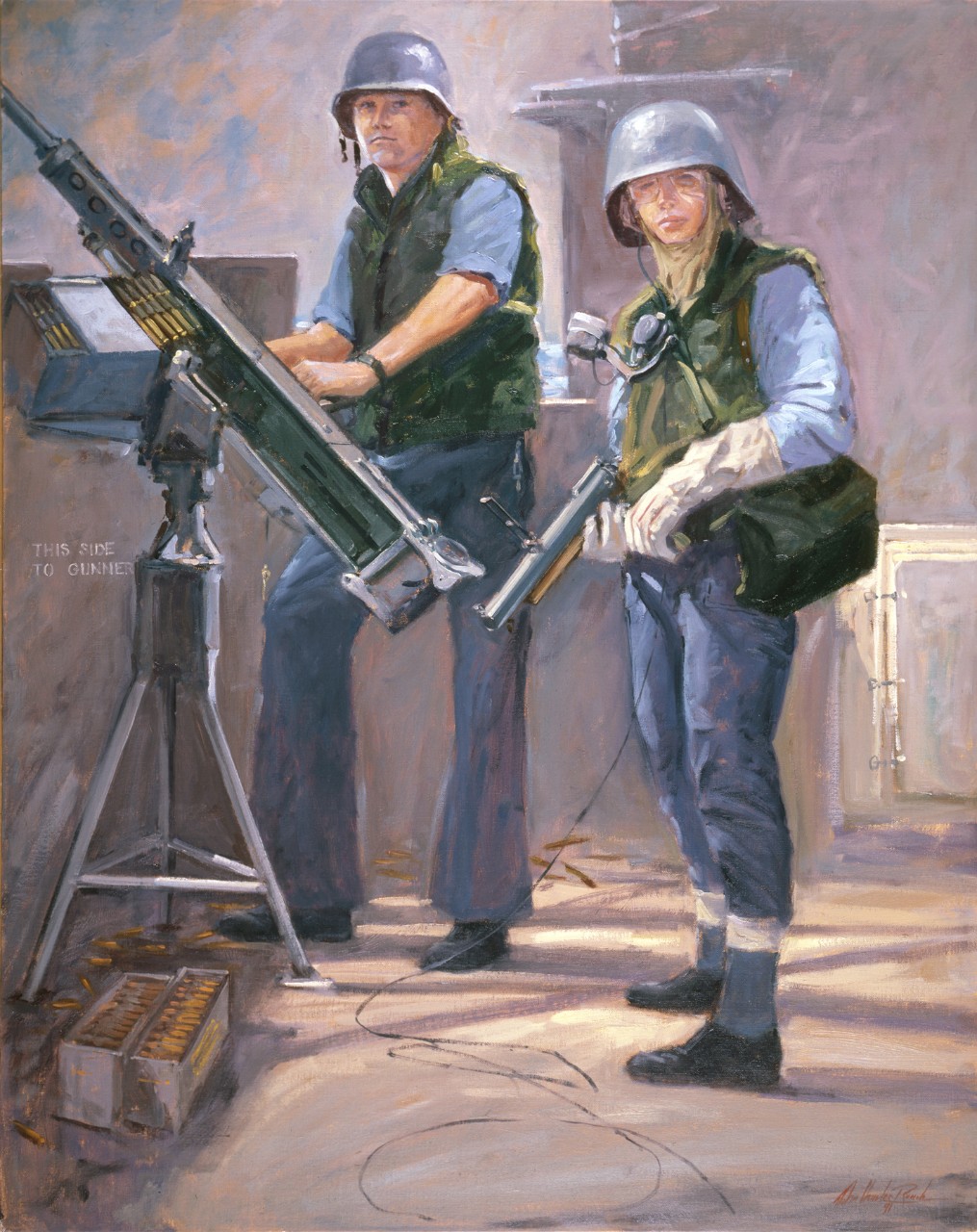 A man and a woman stand next to a 50-caliber gun