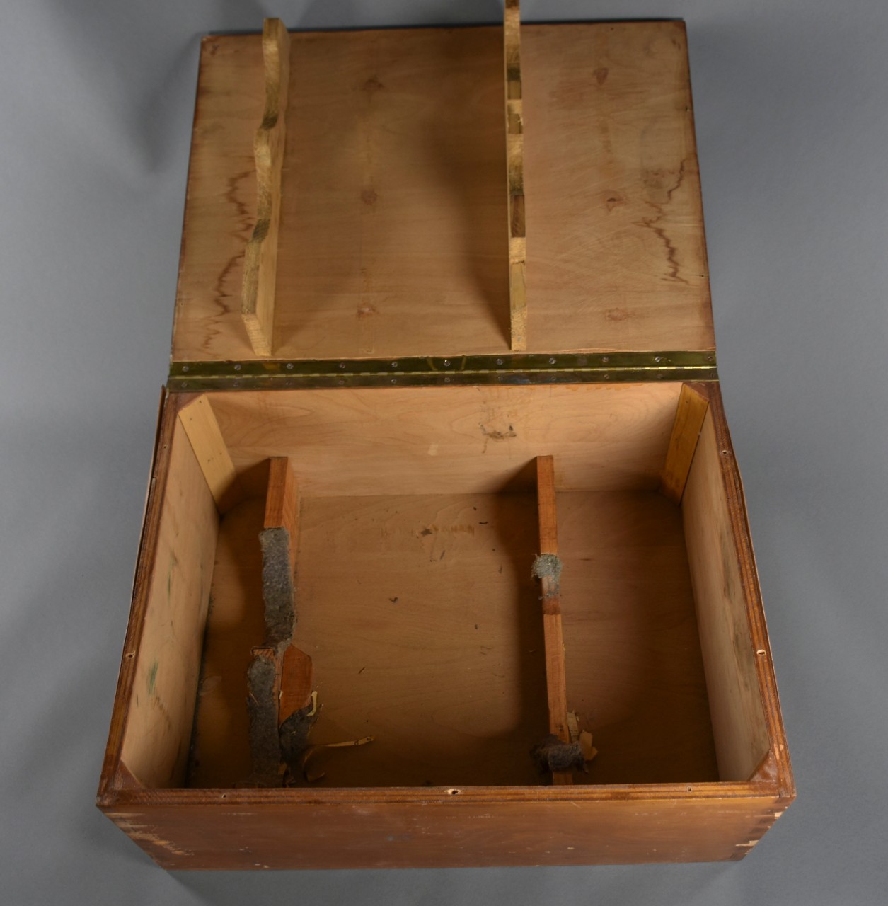 Wooden case with open lid and custom mount for holding Big Eye Japanese Binoculars