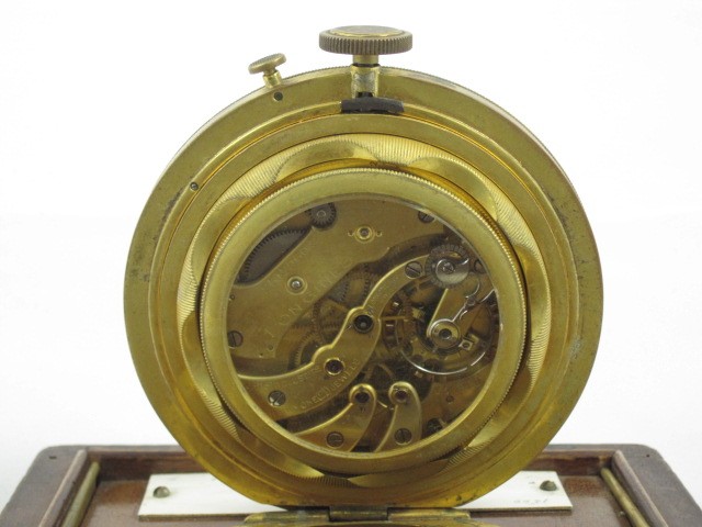 Longines Chronometer reverse image gold backing showing inner workings