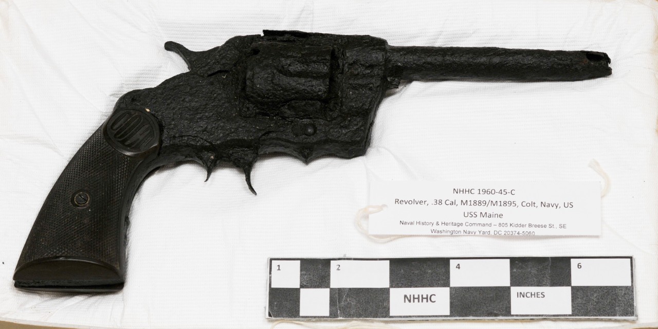 One .38 Caliber Colt Navy Revolver Model 1889/1895 recovered from the wreck of the USS Maine. Significant salt corrosion.