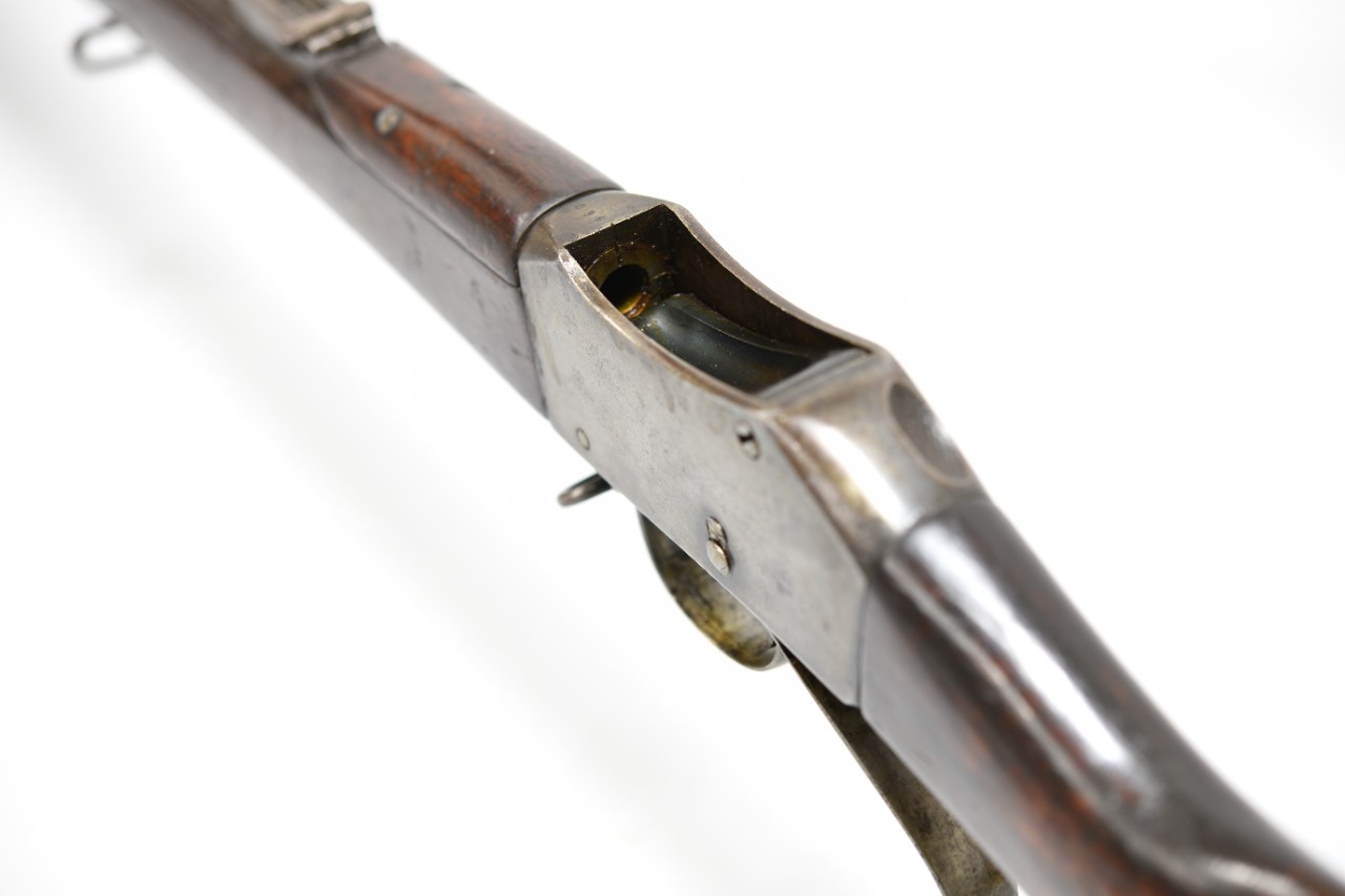 View of the top of the rifle showing the Martini-Enfield drop block action open.  