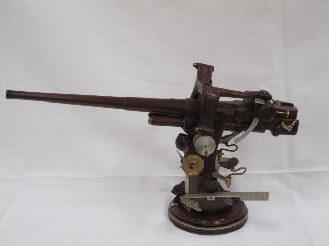 opposite side view of main image wood gun with metal accents