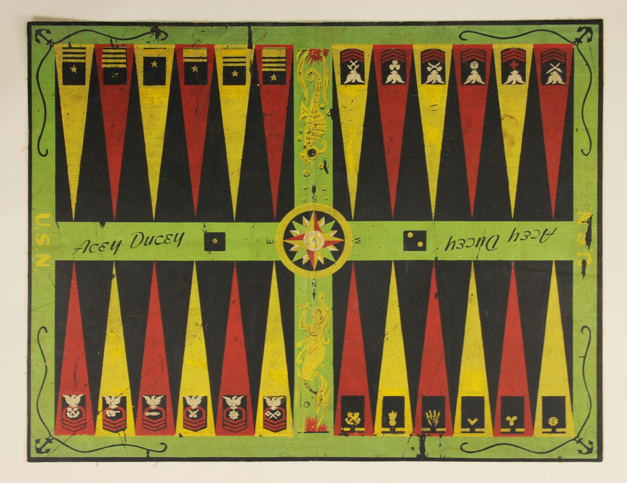 One colorful Navy themed acey ducey board with red yellow black and green colorations 