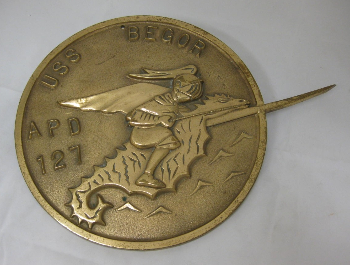 Round Bronze plaque with knight riding seahorse