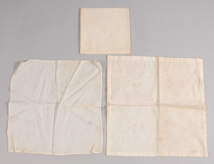<p>white fabric kerchiefs from Finch Chaplains Kit</p>
