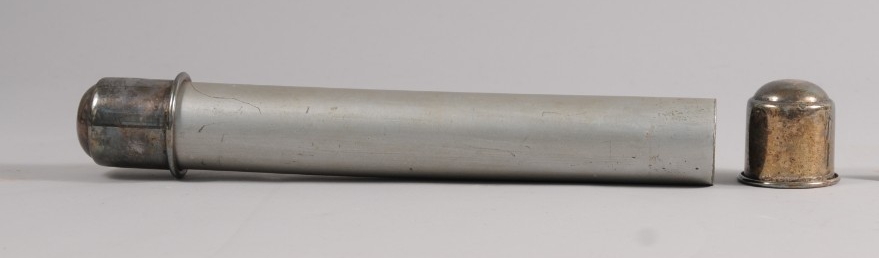 silver tube for holding vestements. found photographed vestements at donation