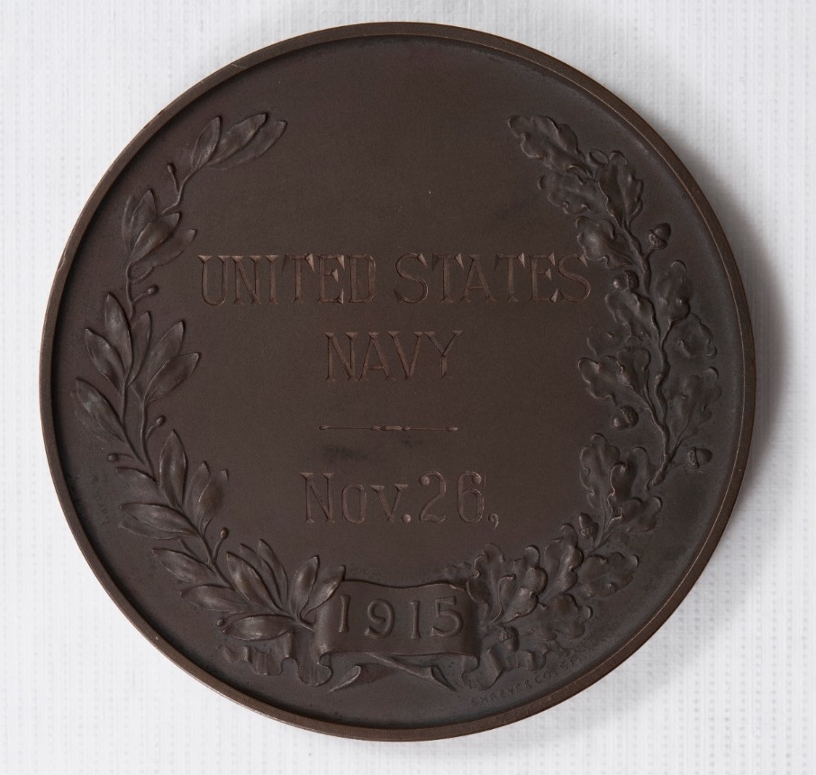 <p>engraved with the United States Navy</p>
