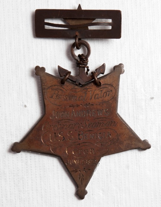 <p>one bronze medal of honor planchet engraved to John Andrews of the USS Benicia for actions in &quot;Corea&quot;</p>