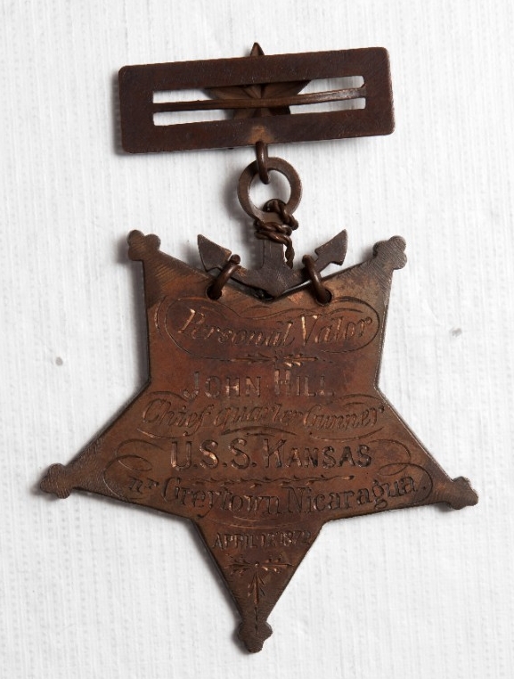 <p>Reverse engraving of Medal of Honor of George (John) Hill</p>
