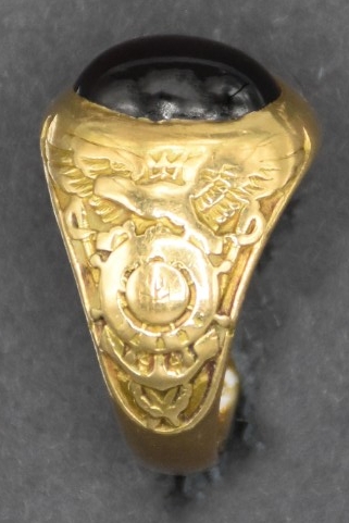 One US Naval Academy midshipman class ring from the class of 1923. Obverse left side has the Naval Academy crest.