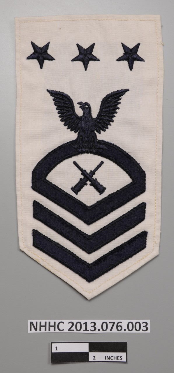 <p>MCPON Rating Badge, White Uniform color scheme</p>
