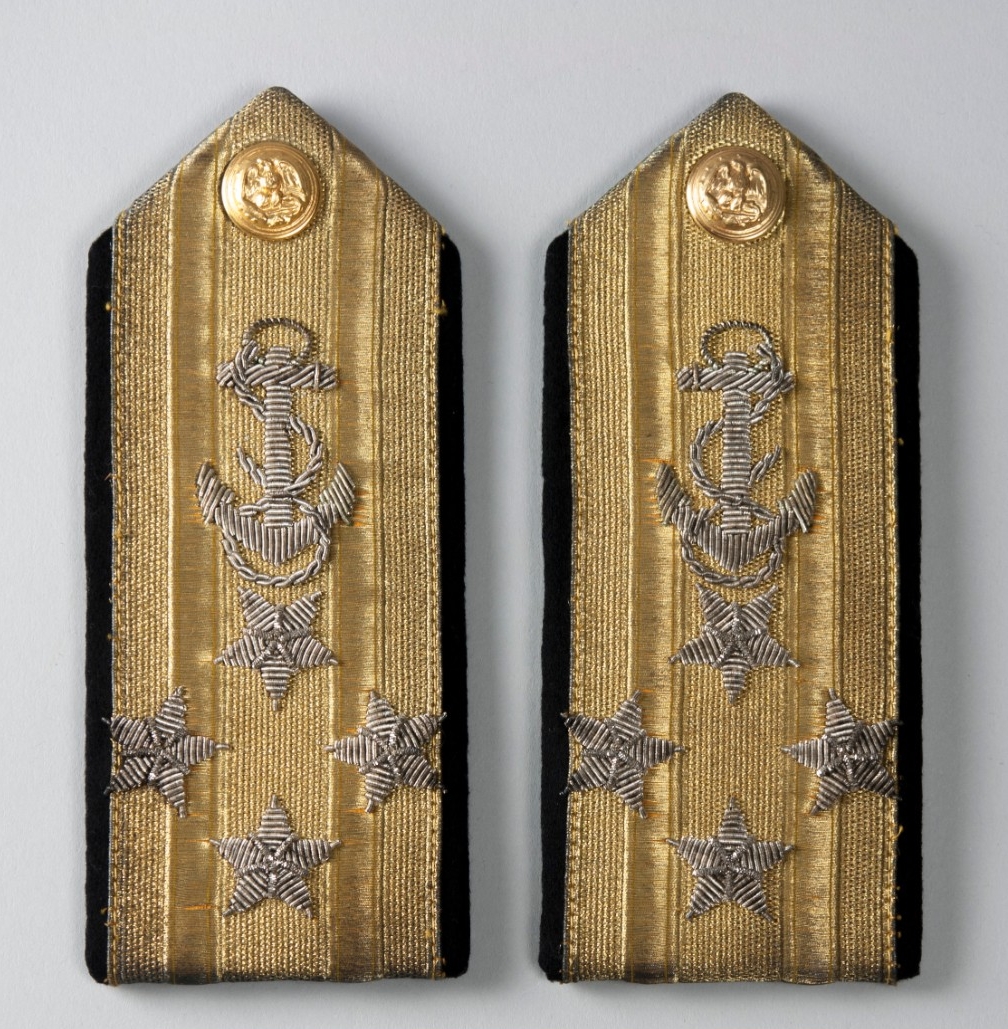 Goldwork with Silver emboridery of anchors and stars pentagon shaped shoulder boards