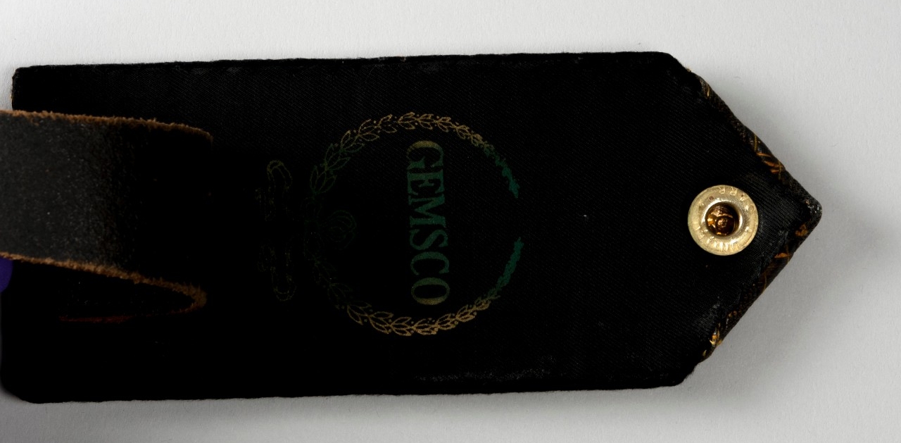 Makers Mark of GEMSCO stamped on black leather of shoulder strap