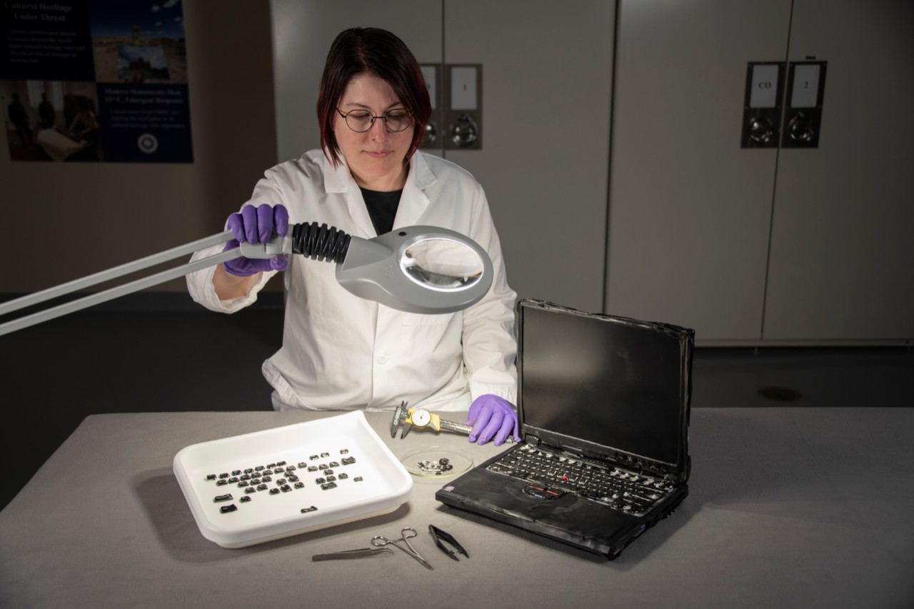 Conservator Francis Lukezic begins assessing the laptop recovered from the Pentagon shortly after 9/11.