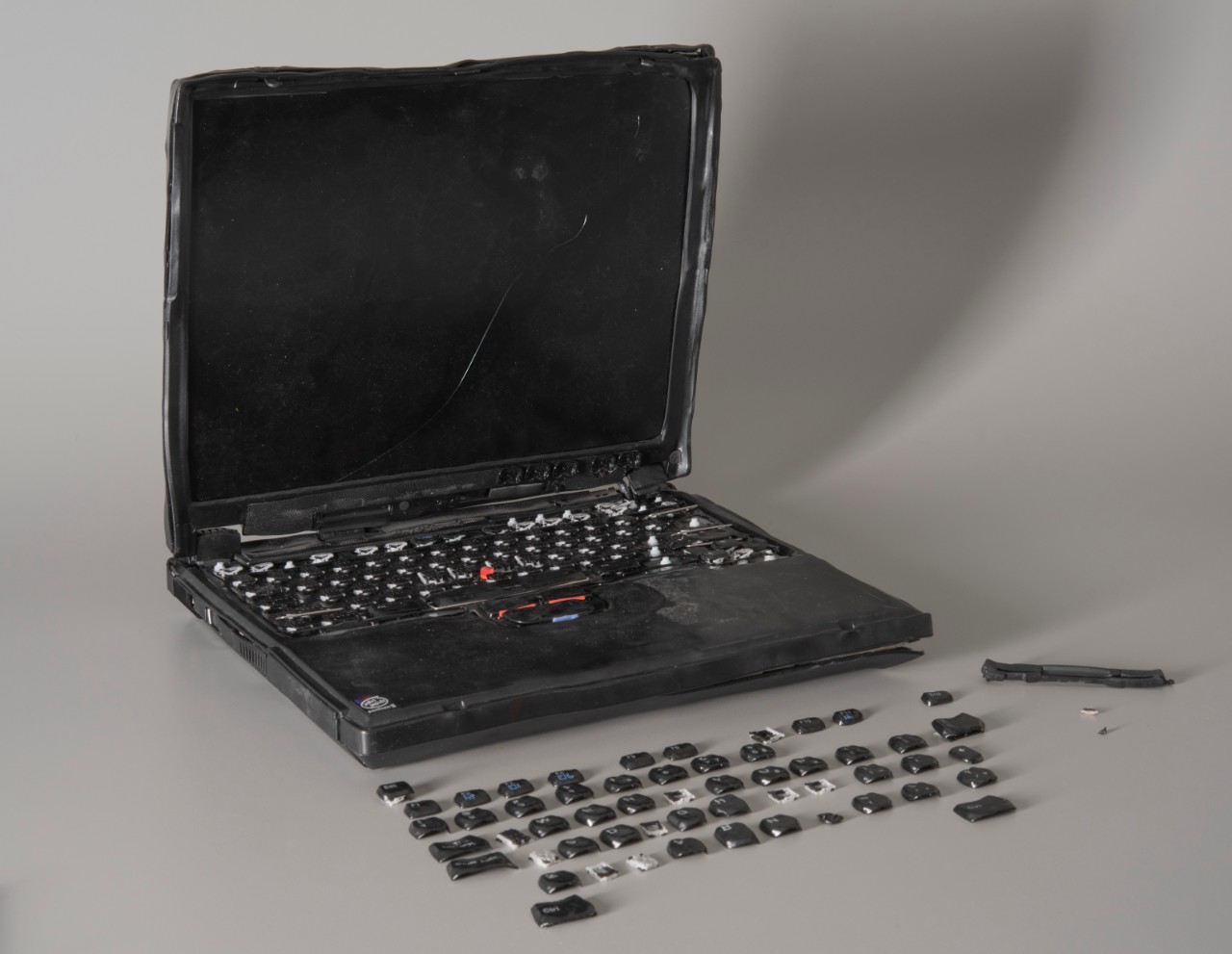 <p>Badly damaged laptop recovered from the Pentagon shortly after 9/11, prior to assessment by Conservation Branch staff.&nbsp;</p>