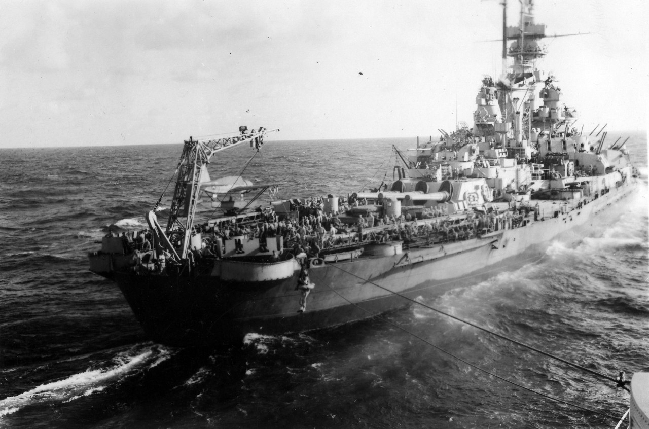 Collection of 23 b/w photographs from WII. The original owner of the imagery is unknown and there is limited captioning to the photographs. Subject matter includes several shots of buddies & pals both aboard ship (unidentified) and on shore; USS Missouri (BB-63); USS Stockham (DD-683); and several Japanese personnel aboard an unidentified US Navy ship (they may be aboard USS Missouri for the surrender ceremony). There are also several images of what is noted to be USS Detroit (CL-8) taking on oil while alongside USS Missouri (views include a highline transfer between the two ships). USS Detroit was one of two ships present at the signing of the Japanese surrender, so the entire series may be part of the Japanese surrender. 