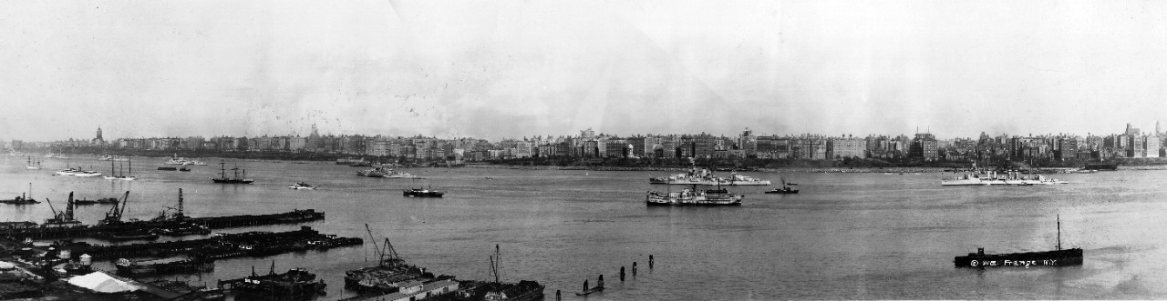 Oversize panoramic of US Navy ships in the Hudson River, NY with Riverside Drive in the background, circa 1929-1930. There are two battleships, including USS New York (BB-34), and five Omaha Class Light Cruisers, a few destroyers, and several large yachts present. 