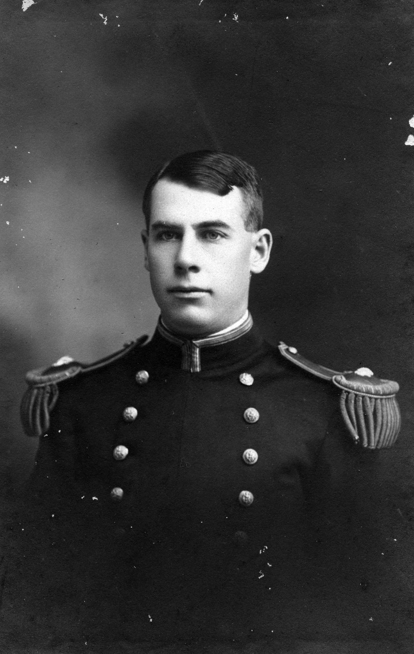Collection of six photographs of RADM Wilhelm L. Friedell, US Naval Academy 1905. One photograph shows Friedell as a junior officer, with three showing him as a US Naval Academy Midshipman. The other two images, cataloged in the NH system as NH 96109 and NH 96110, are of him as a Rear Admiral (while as Commander, Submarine Force, U.S. Fleet circa 1941, and in 1943, while in command of the Mare Island Navy Yard). 