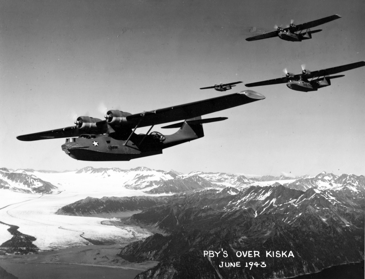 PBYs flying over Kiska, Aleutian Islands, June 1943. From the VADM Robert C. Giffen Photo Collection. 