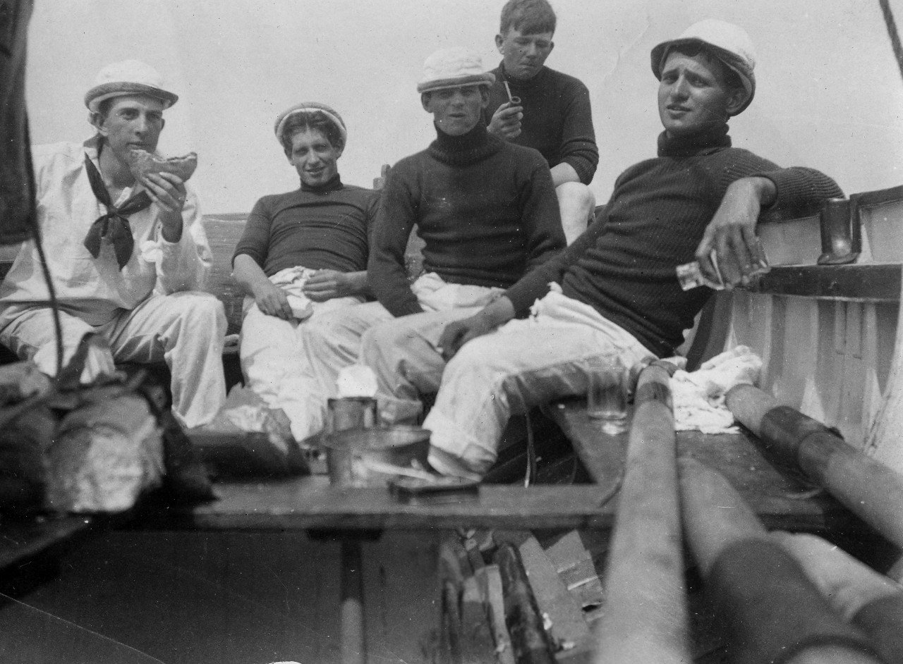 US Naval Academy midshipmen, including: (l to r) Frank Eklund, Joe Morrison, illegible, Earle Farwell, & John Sumpter. The midshipmen are part of the Naval Academy class of 1905. Image is from the Clarence Grace Collection.