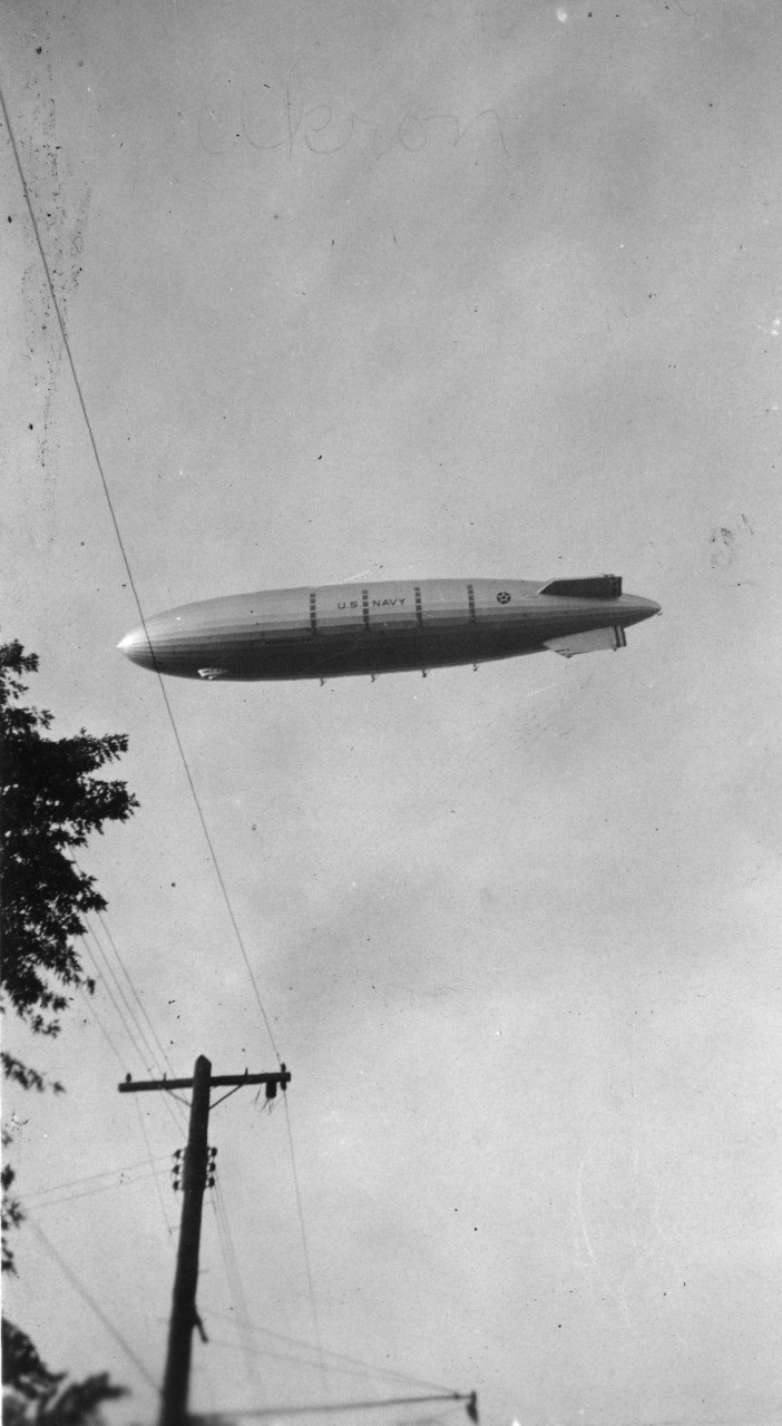 2 black and white photographs of USS Akron (ZRS-4), taken in the vicinity of Cleveland, Ohio. Photos were likely taken by the donor’s grandmother, or by her uncle Gordon Carson. 