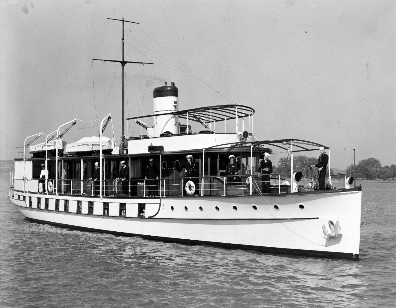 Collection of six b/w photographs related to the naval service of John Leonard Newton Scrogham, Boatswain’s Mate Second Class, circa 1939. Scrogham’s first assignment was service aboard USS Sequoia (presidential yacht, though in 1939 it was the yacht of the Secretary of the Navy). The collection includes an image of the ship as well as one of its crew (which includes Scrogham). Also included is a portrait of Scrogham. His discharge papers note that he also served aboard USS Ranger and USS Missouri, (a 1939 image of USS Ranger is also included in the collection). 