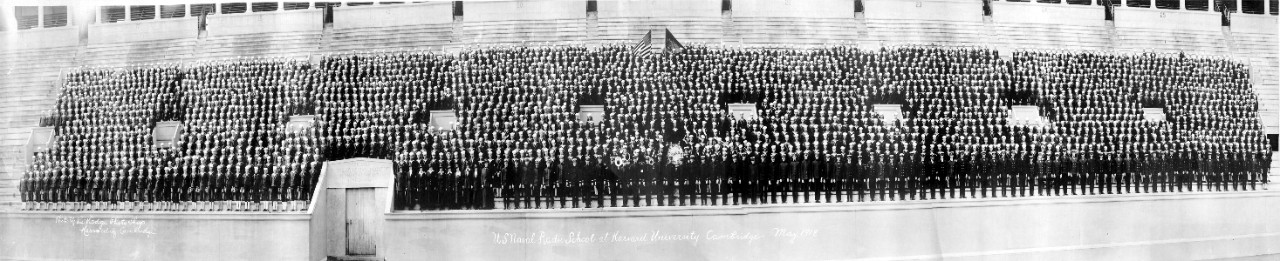 Oversize panoramic of the officers and men of the U.S. Naval Radio School, Harvard University, Cambridge, MA, May 1918. Photo was taken in Harvard University's stadium. Image is part of the Gilman L. Smith collection. 