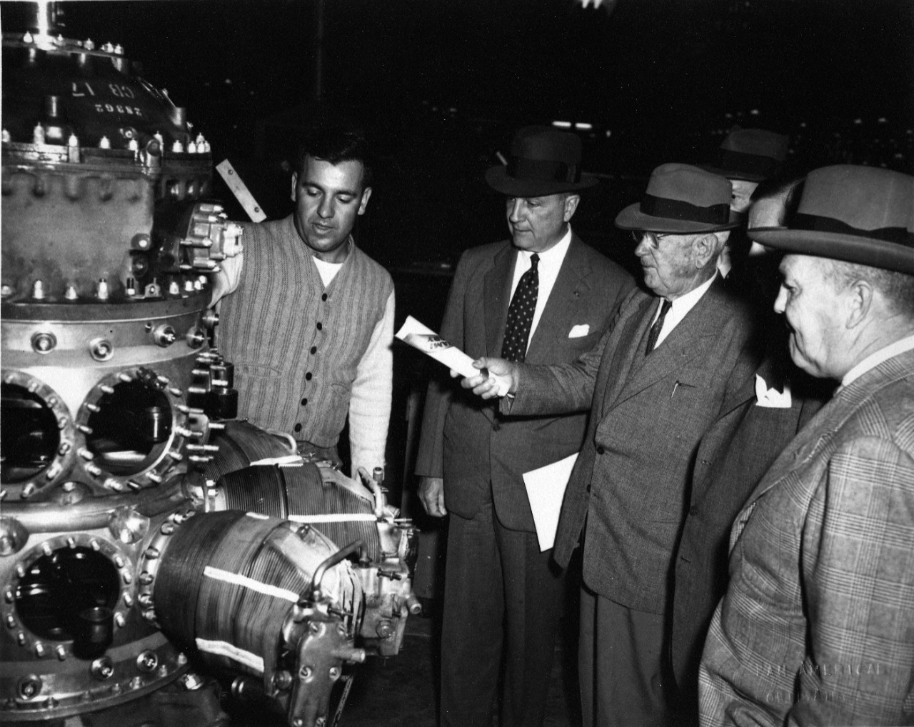 Admiral William H. Standley, USN (Ret) (at center, pointing) tours a Pan American World Airways facility, likely in Miami. Original photo by Pan American World Airways Public Relations.