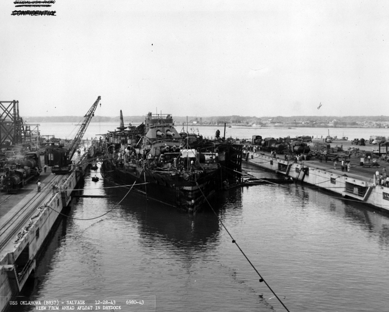 S-082-D(6).05 USS Oklahoma Salvage, Entering Drydock