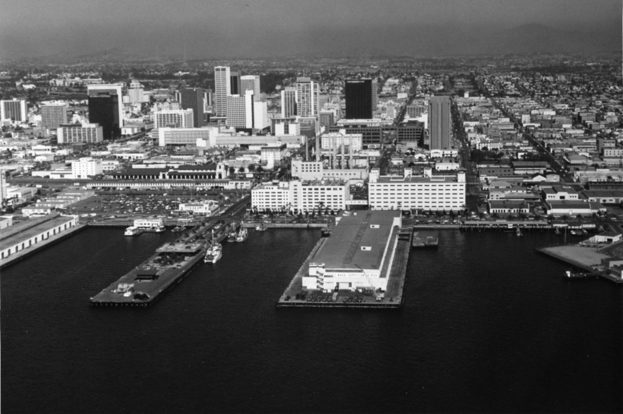An aerial view of San Diego, California, with the Naval Supply Center Pier in the foreground.