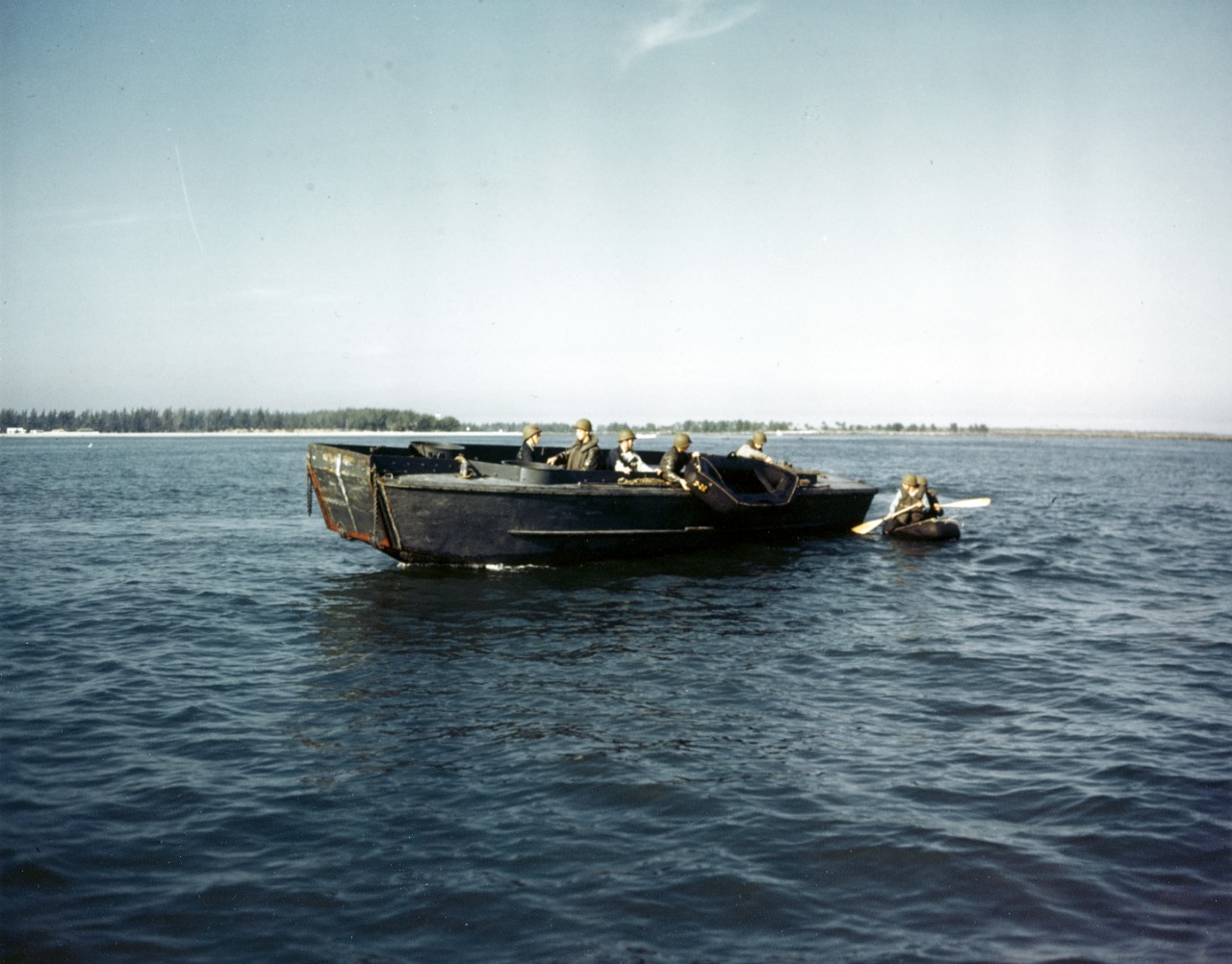 Rubber rafts are launched from a Navy LCPR landing craft, for trainees to paddle ashore to the objective, during World War II.