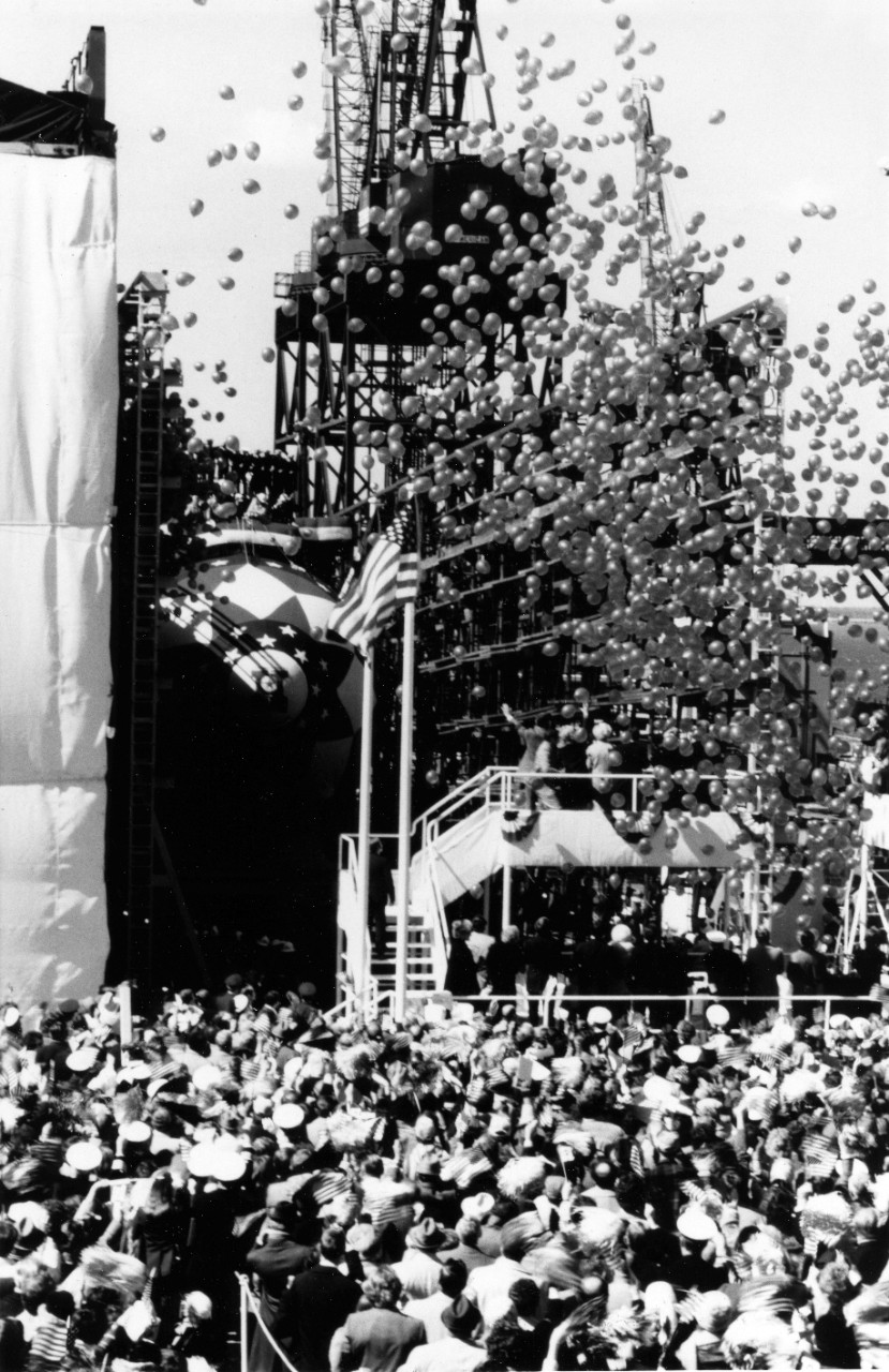 Newport News - balloons fill the air as the nuclear powered attack submarine USS Houston (SSN-713) slides down the ways. March 21, 1981. 