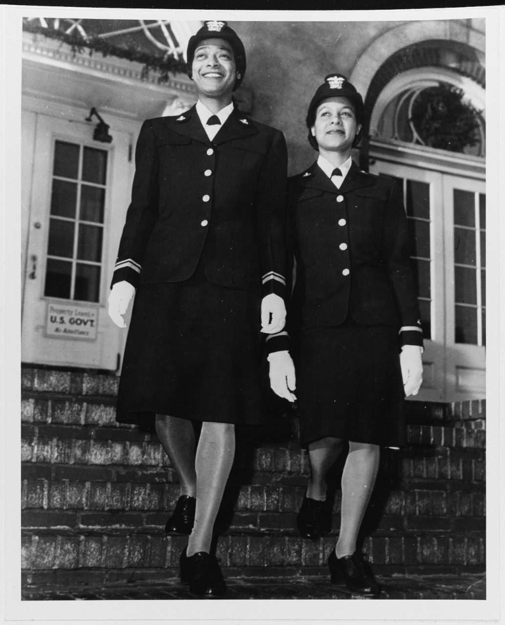 Lieutenant (Junior Grade) Harriet Ida Pickens (left) and Ensign Frances Wills photographed after graduation from the Naval Reserve Midshipmen's School (WR) at Northampton, Massachusetts, in December 1944. They were members of the school's final class, and were the Navy's first African-American WAVES officers. Official U.S. Navy Photograph, now in the collections of the National Archives.