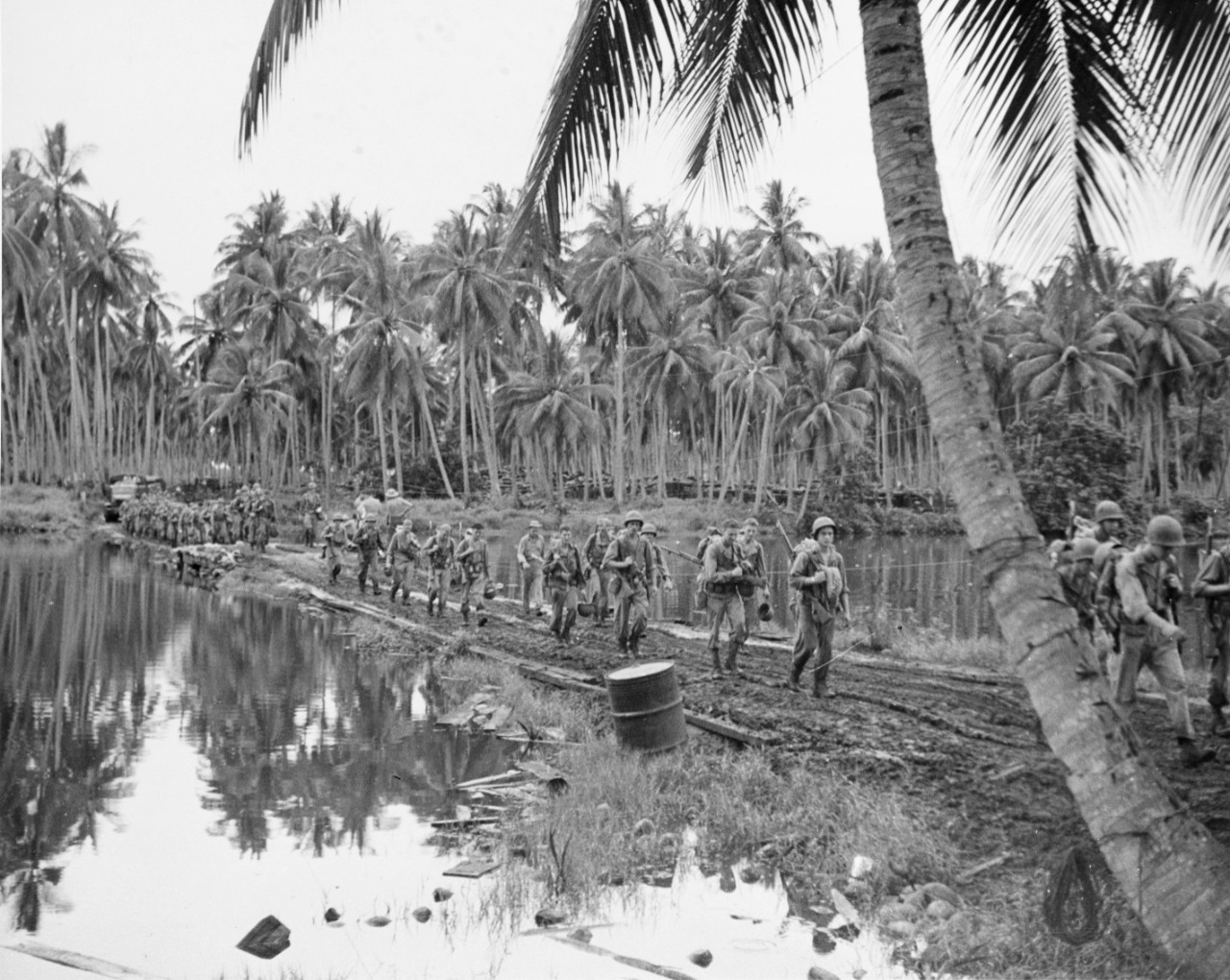 Army units moving toward the front on Guadalcanal, 30 January 1943.