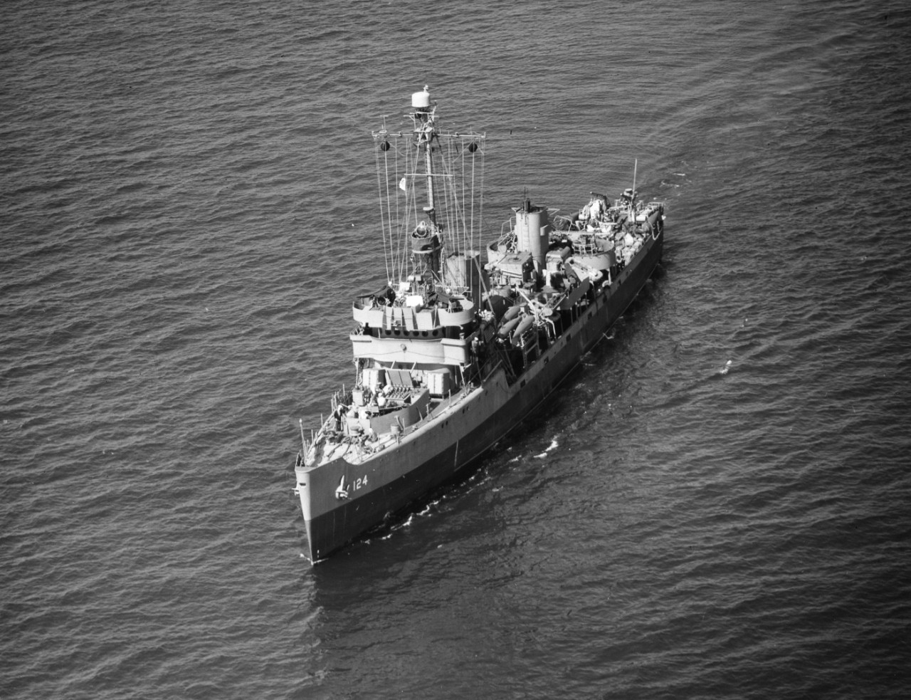 Aerial view of minesweeper USS Threat (AM-124) underway