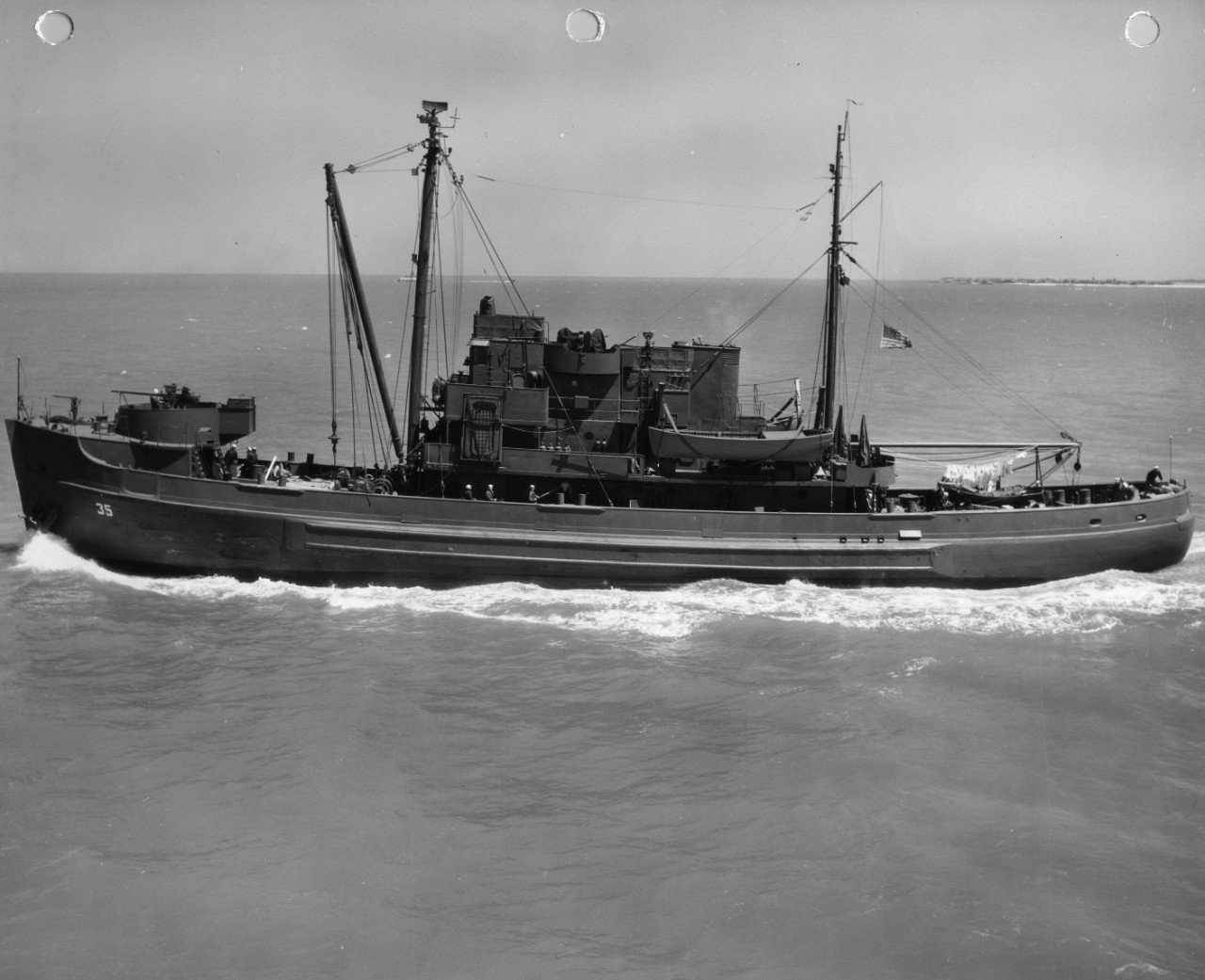 Port broadside view of salvage and rescue ship USS Weight (ARS-35) underway