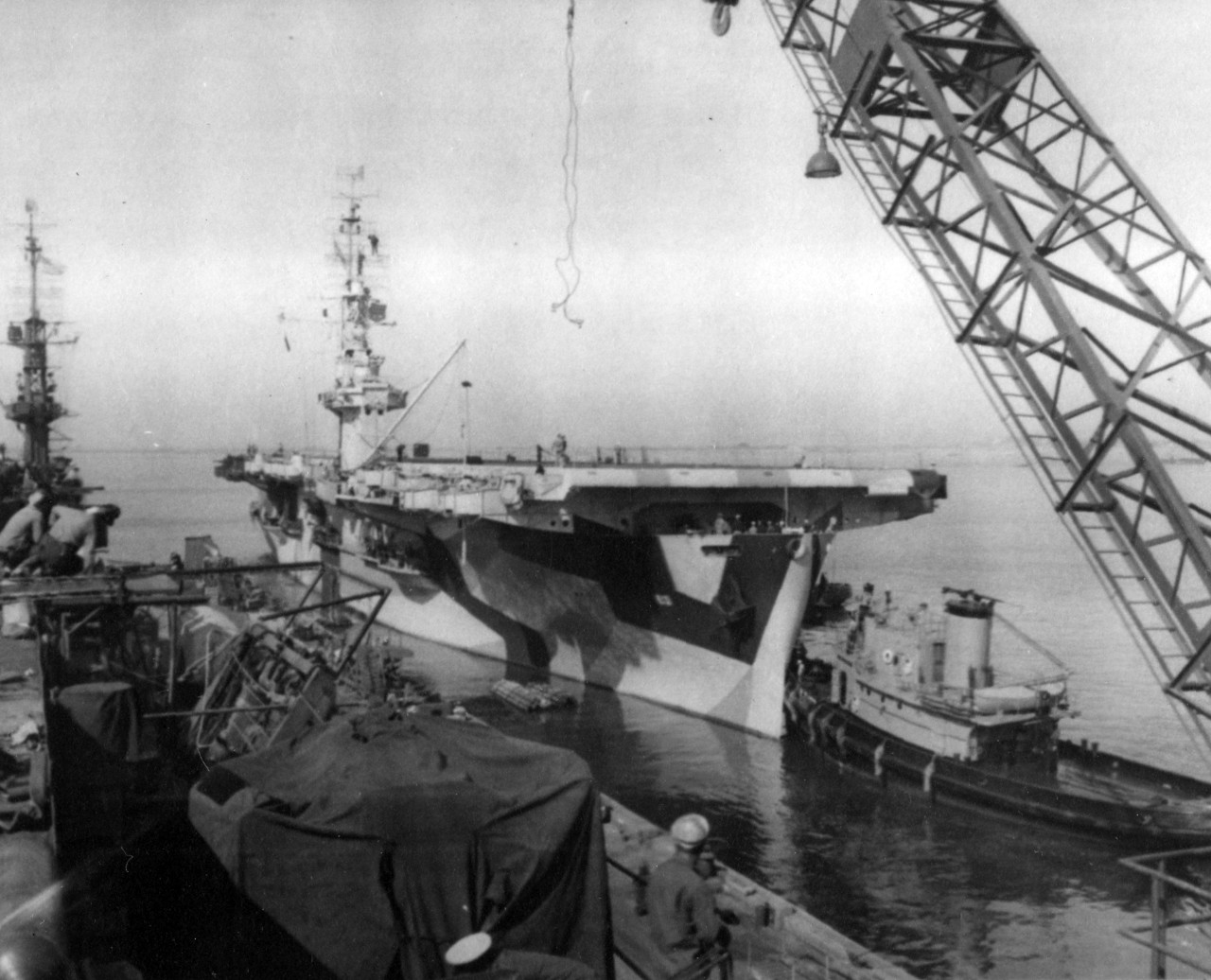 <p>USS St. Lo (CVE-63) leaving the destroyer base at San Diego, CA. Photo taken aboard USS White Plains (CVE-66).</p>