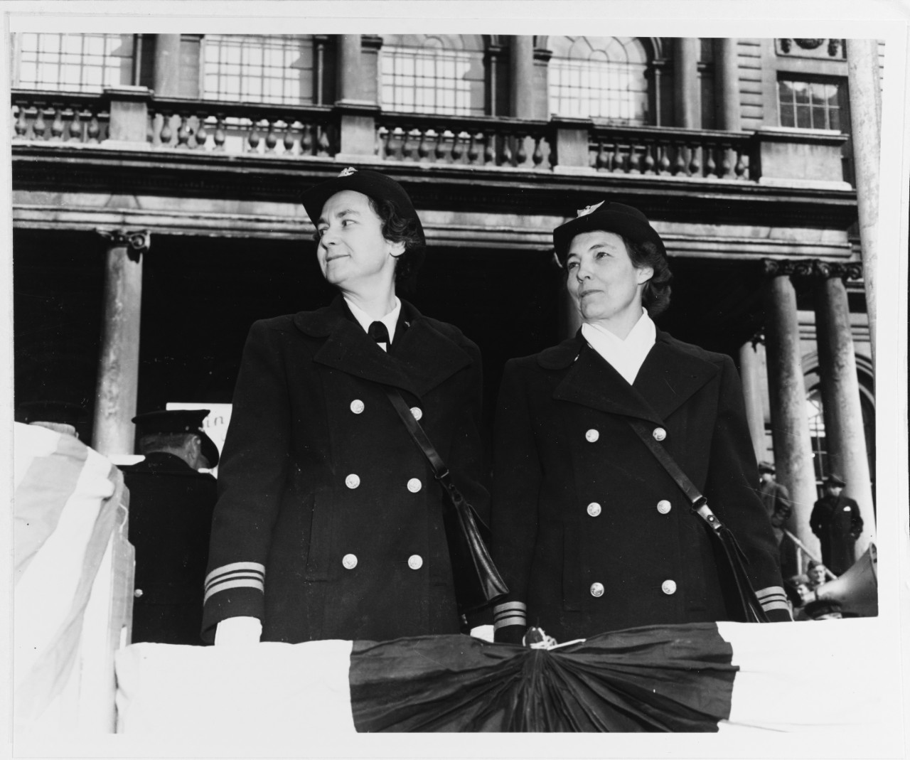 Photo #: 80-G-40693  Lieutenant Commander Mildred H. McAfee, USNR, Director of the WAVES (left), and  Lieutenant Commander Dorothy Stratton, USCGR, Director of the SPARS
