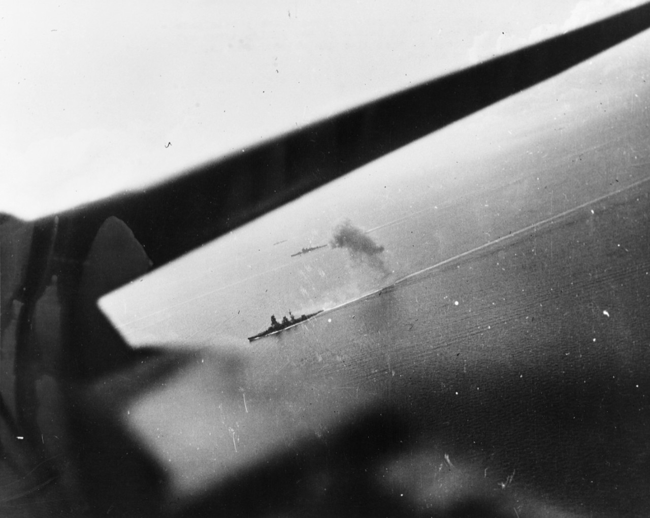 Japanese battleship Nagato and a Nachi-class cruiser under air attack during the Battle of the Sibuyan Sea, 24 October 1944. Photo by a plane from USS Intrepid (CV-11).