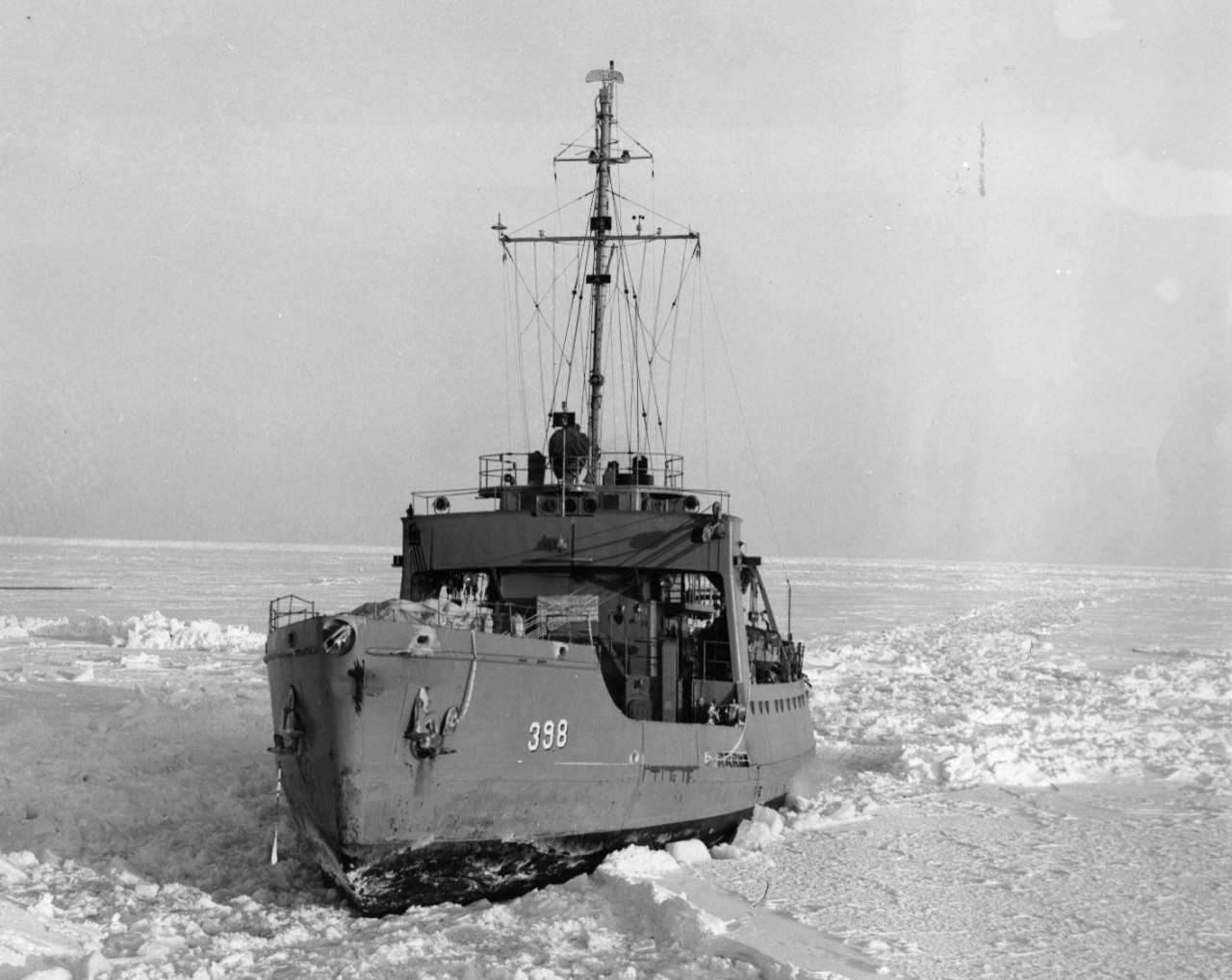 USS Redbud (AKL-398) stuck in ice before being freed by USS Edisto (AGB-2), January 1952