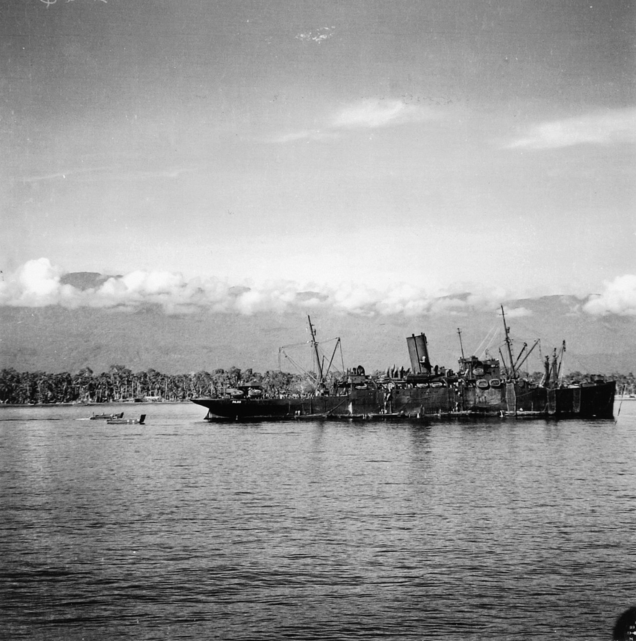 Troops practice landings from USS John Penn (APA-23) in August 1943 off Guadalcanal, Solomon Islands. Photo taken from USS Nicholas (DD-449)