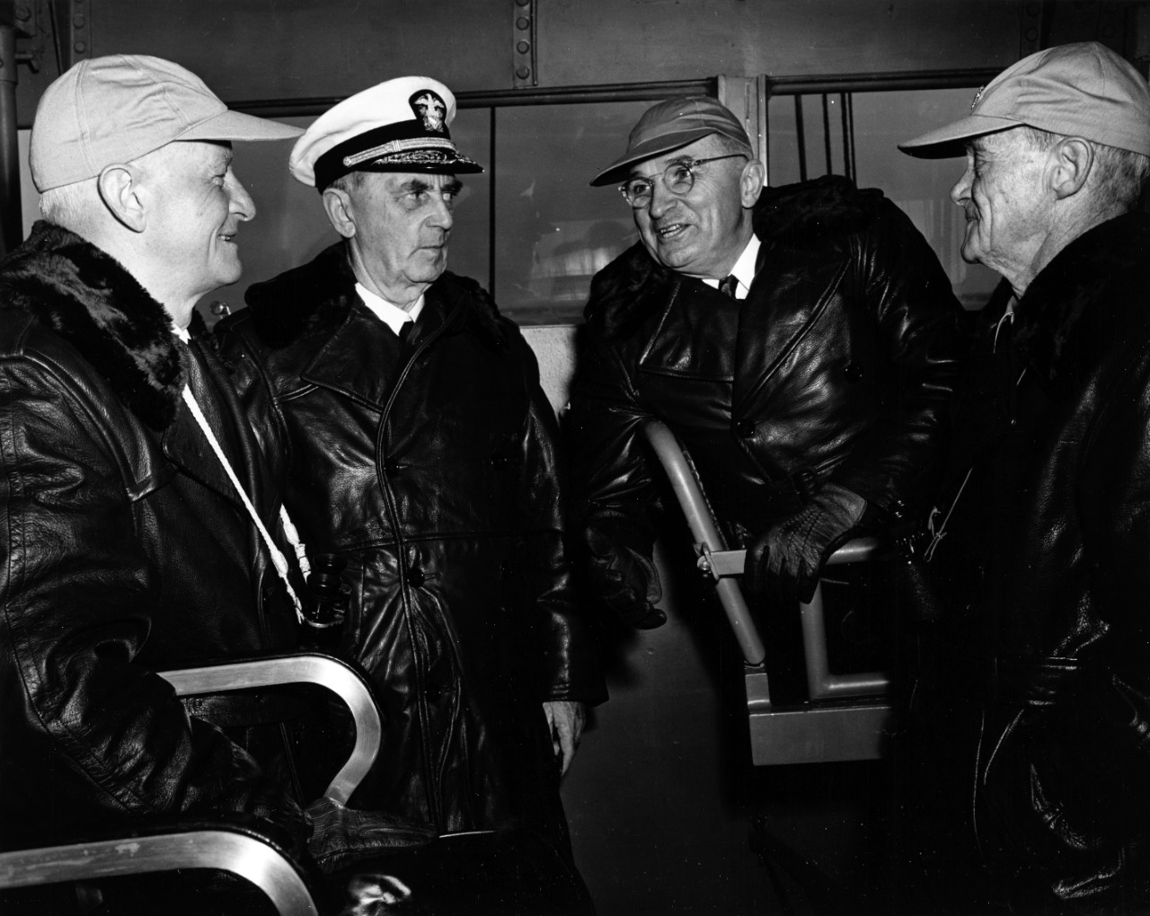 Photo #: 80-G-702511  Fleet Admiral Chester W. Nimitz, USN, Fleet Admiral William D. Leahy, USN, President Harry S. Truman, Vice Admiral Marc A. Mitscher, USN