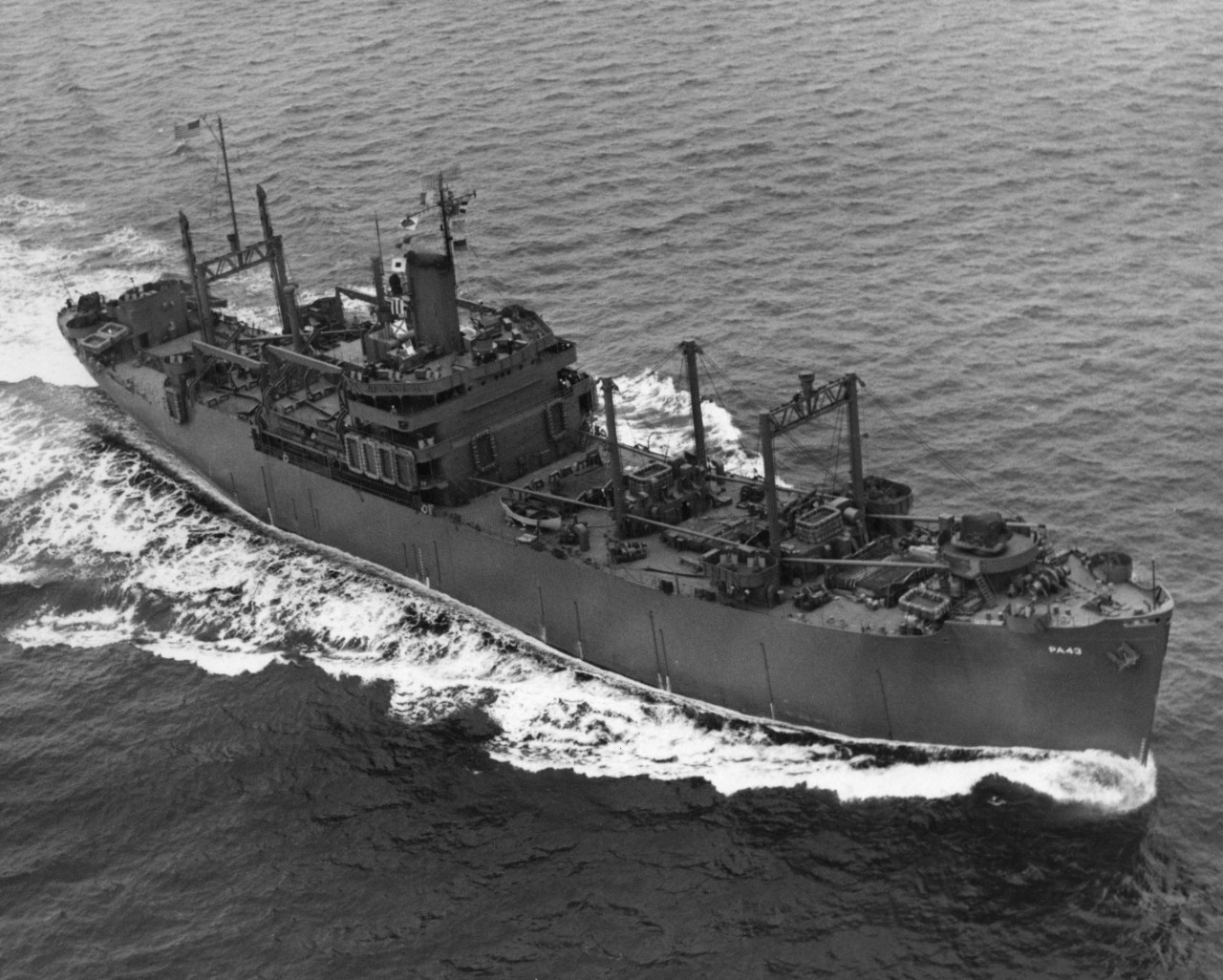 USS Fayette (APA-43) underway in the New York Harbor area. Note that none of her boats have been embarked. Photo taken by a plane from Naval Air Station New York, from an altitude of 400 feet.